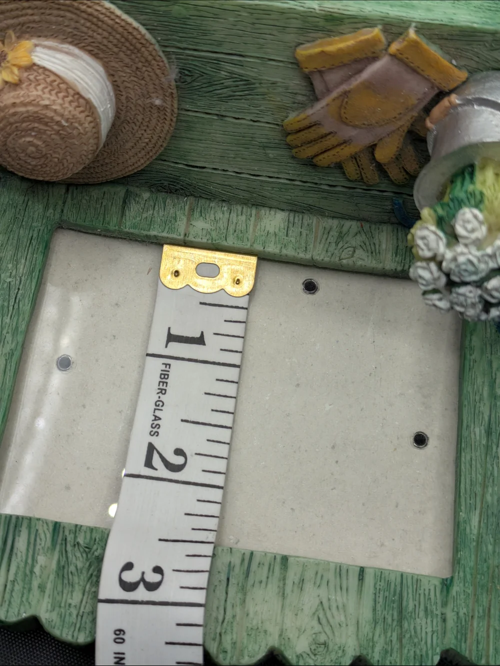 Green Wooden Bench Picture Frame with Hat and Potted Flowers
